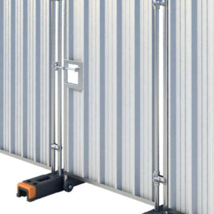 Hoarding pedestrian gate featuring galvanised steel construction with corrugated infill panel, integrated locking mechanism and stabilising feet, designed to provide secure pedestrian access within a temporary site hoarding system.